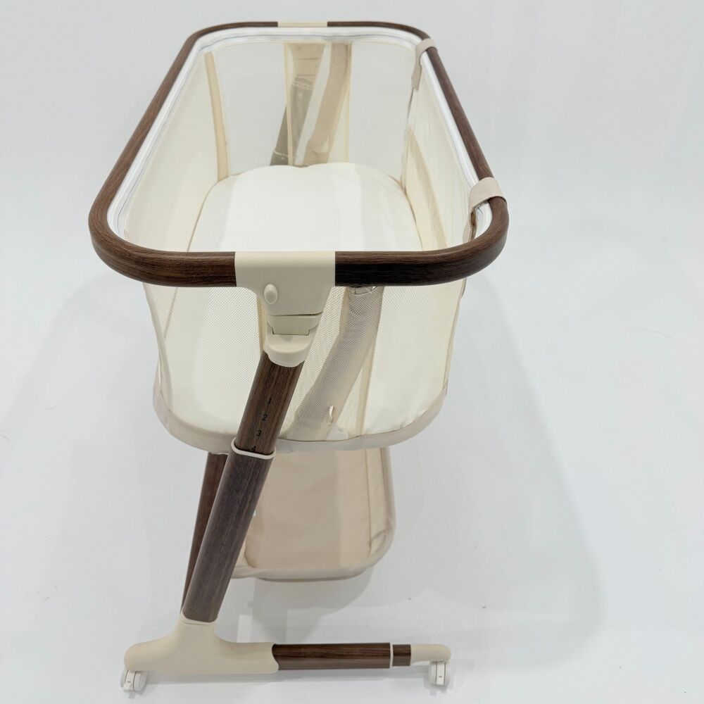 Baby Studio Dream Glider Bassinet Lockable Wheels Wood Grain