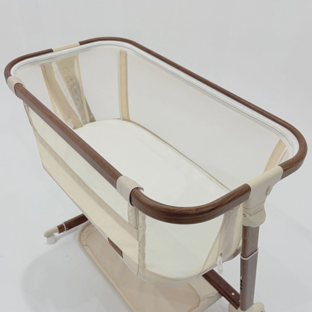 Baby Studio Dream Glider Bassinet Lockable Wheels Wood Grain