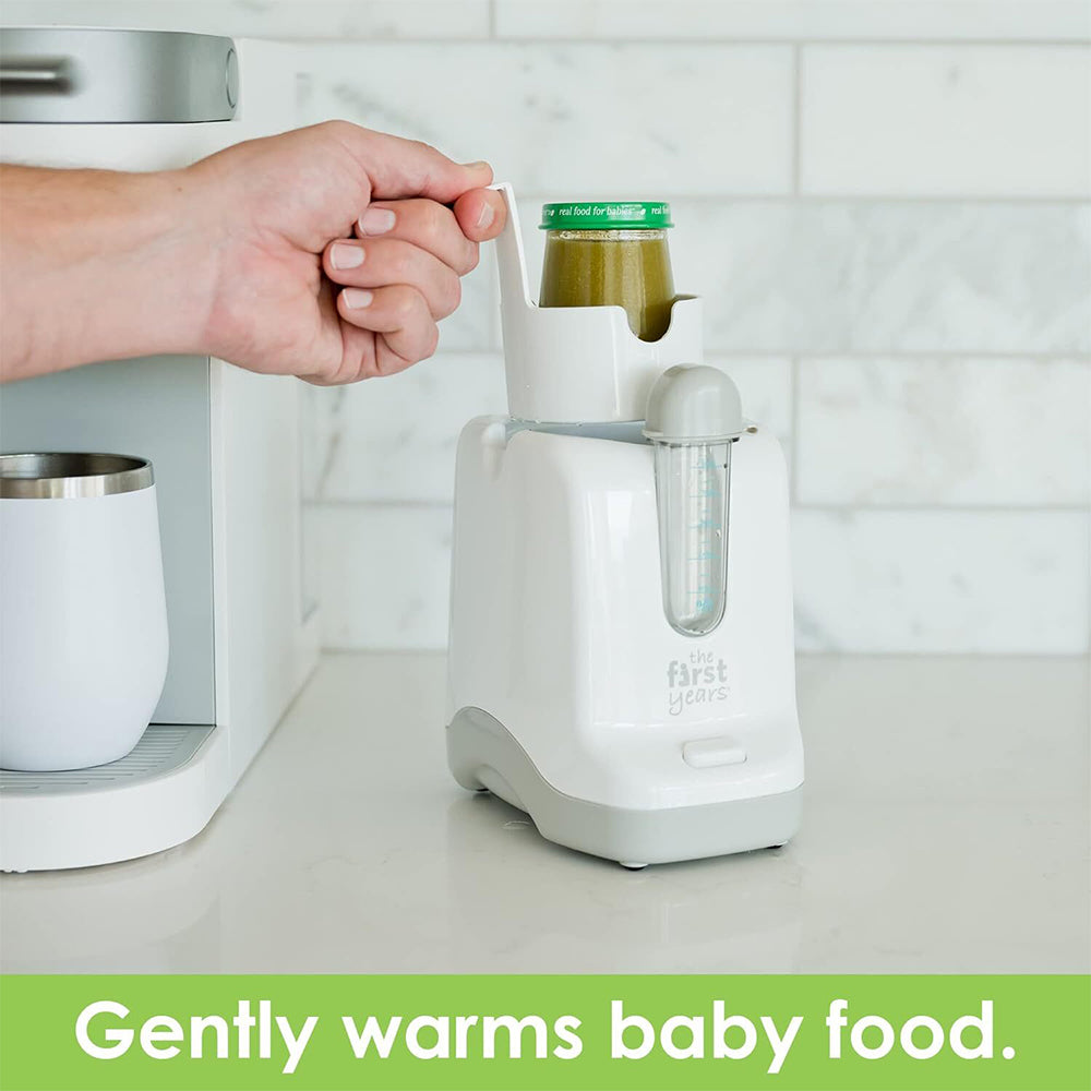 The First Years Quick Serve Bottle Warmer with pacifier sanitizer
